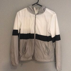 A white,grey and black wind breaker